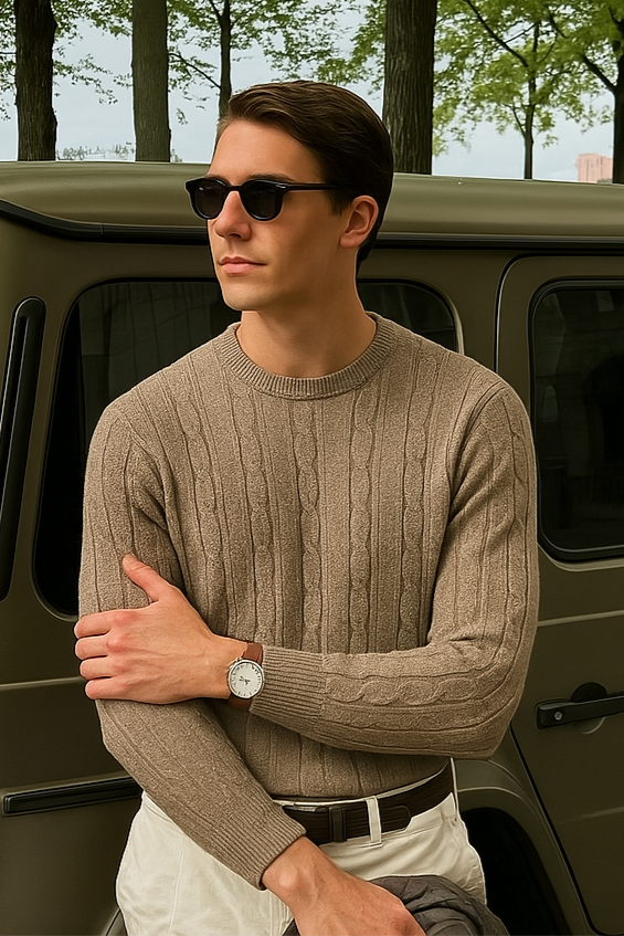 Men’s cashmere cable-knit sweater with ribbed neck and cuffs.