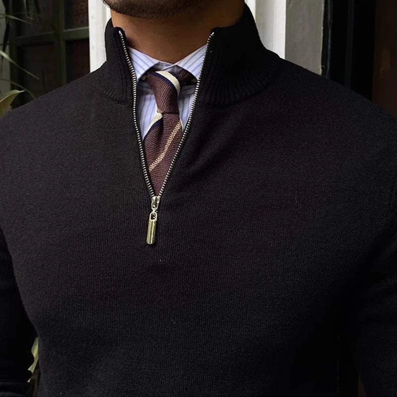 Men’s half zip pullover sweater styled with beige trousers for a smart casual look.