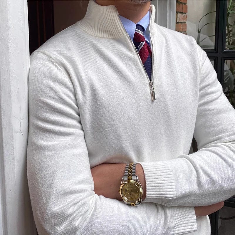 Men’s half zip pullover sweater styled with beige trousers for a smart casual look.